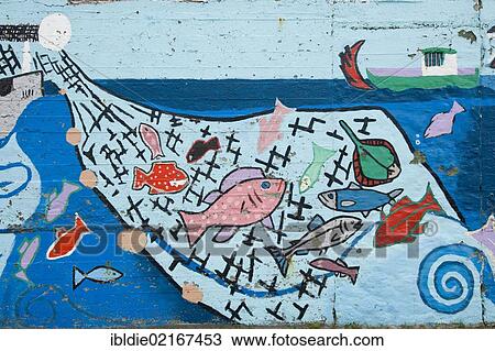 Stock Image - Net full of fish, mural, graffiti, Iceland, Europe. Fotosearch