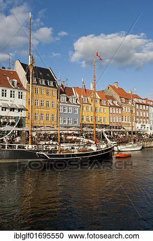 Nyhavn, bar district on the port canal, Copenhagen, Denmark, Europe View Large Photo Image Stock Image - Nyhavn, bar district on the port canal, Copenhagen, Denmark, Europe. Fotosearch