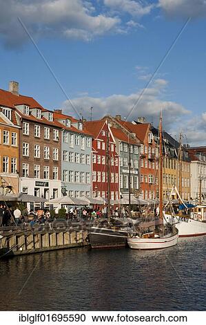 Stock Image - Nyhavn, bar district on the port canal, Copenhagen, Denmark, Europe. Fotosearch