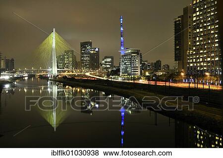 Octávio Frias de Oliveira Bridge, inaugurated on 10 May 2008, Rio Pinheiros, and modern high-rise buildings, Morumbi district, Sao Paulo, Brazil, South America View Large Photo Image Stock Photo - Octávio Frias de Oliveira Bridge, inaugurated on 10 May 2008, Rio Pinheiros, and modern high-rise buildings, Morumbi district, Sao Paulo, Brazil, South America. Fotosearch