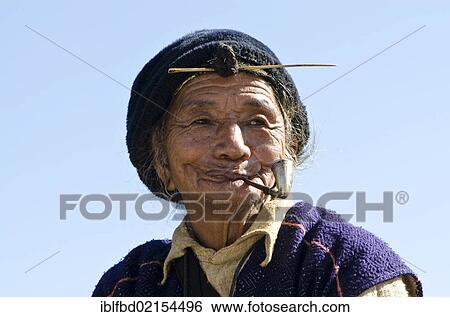 Old Apatani man with the typical hair knot at the forehead, Hari village, Arunachal Pradesh, India, Asia View Large Photo Image Stock Photograph - Old Apatani man with the typical hair knot at the forehead, Hari village, Arunachal Pradesh, India, Asia. Fotosearch