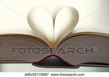 Open book with heart-shaped, curved, inner pages View Large Photo Image Stock Photo - Open book with heart-shaped, curved, inner pages. Fotosearch