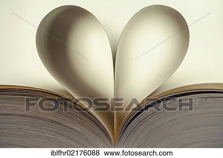 Open book with heart-shaped, curved, inner pages View Large Photo Image Stock Photo - Open book with heart-shaped, curved, inner pages. Fotosearch