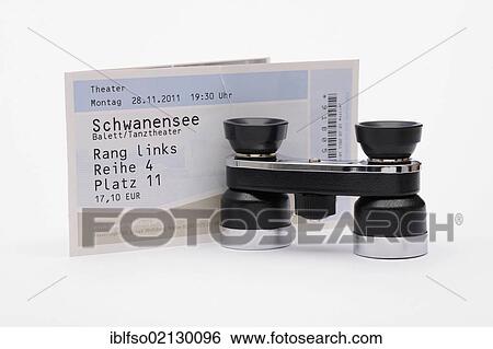 Stock Photograph - Opera glasses and a ticket for the theatre. Fotosearch