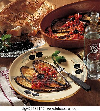 Stock Image - Ottoman eggplant with tomato sauce and vegetables, Turkey, Asia. Fotosearch