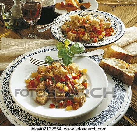 Picture - Panzanella, colourful Tuscan bread salad, with tomatoes, colourful peppers and croutons, Italy, Europe. Fotosearch