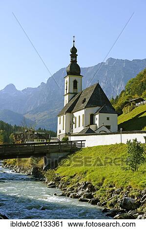 Parish Church of St. Sebastian and Ramsauer Ache River in front of the Reiteralpe Mountains, Berchtesgadener Land, Upper Bavaria, Germany, Europe View Large Photo Image Stock Image - Parish Church of St. Sebastian and Ramsauer Ache River in front of the Reiteralpe Mountains, Berchtesgadener Land, Upper Bavaria, Germany, Europe. Fotosearch