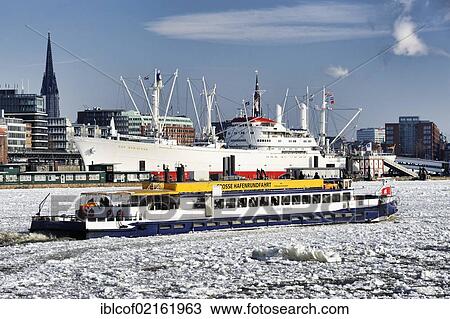 Stock Image - Passenger ship in the winter port of Hamburg, Hamburg, Germany, Europe. Fotosearch