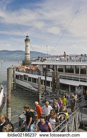 Passengers disembarking a cruise vessel, Lindau, Lake Constance, Baden-Wuerttemberg, southern Germany, Germany, Europe View Large Photo Image Stock Photo - Passengers disembarking a cruise vessel, Lindau, Lake Constance, Baden-Wuerttemberg, southern Germany, Germany, Europe. Fotosearch