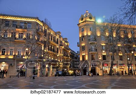 Stock Photo - Pedestrians on the illuminated Fountain Square, historic city centre of Baku, UNESCO World Heritage Site, Azerbaijan, Caucasus, Middle East, Asia. Fotosearch