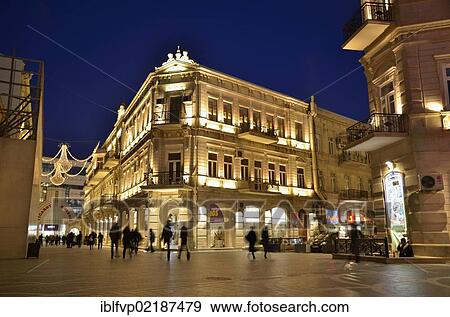 Stock Photo - Pedestrians on the illuminated Fountain Square, historic city centre of Baku, UNESCO World Heritage Site, Azerbaijan, Caucasus, Middle East, Asia. Fotosearch