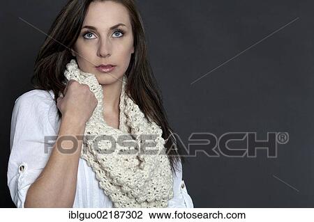 Pensive young woman with a scarf, portrait View Large Photo Image Stock Image - Pensive young woman with a scarf, portrait. Fotosearch