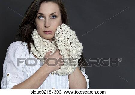 Pensive young woman with a scarf, portrait View Large Photo Image Stock Image - Pensive young woman with a scarf, portrait. Fotosearch