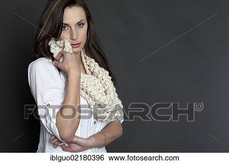 Pensive young woman with a shawl, portrait View Large Photo Image Stock Photograph - Pensive young woman with a shawl, portrait. Fotosearch