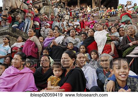 People watching a procession, steps of the Nyatapola Pagoda, Taumadhi Square, Bhaktapur, Kathmandu Valley, Nepal, Asia View Large Photo Image Stock Photo - People watching a procession, steps of the Nyatapola Pagoda, Taumadhi Square, Bhaktapur, Kathmandu Valley, Nepal, Asia. Fotosearch