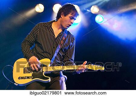 Stock Image - Philip Rhyner, guitarist of the Swiss band Delilah, performing live in the Schueuer concert hall, Lucerne, Switzerland, Europe. Fotosearch