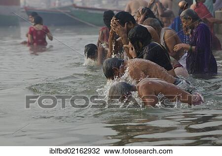 Pilgrims at the ghats of Varanasi in the busy morning hours, Uttar Pradesh, India, Asia View Large Photo Image Stock Image - Pilgrims at the ghats of Varanasi in the busy morning hours, Uttar Pradesh, India, Asia. Fotosearch
