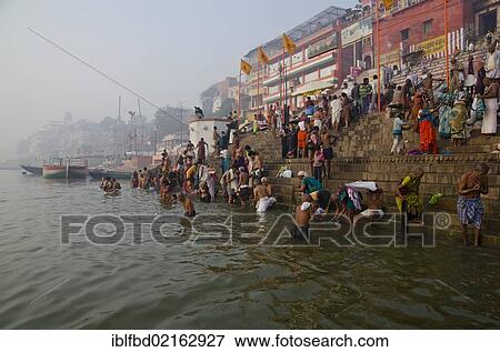 Pilgrims at the ghats of Varanasi in the busy morning hours, Uttar Pradesh, India, Asia View Large Photo Image Stock Photo - Pilgrims at the ghats of Varanasi in the busy morning hours, Uttar Pradesh, India, Asia. Fotosearch