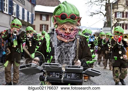 Poison dwarfs, Guggen music, costumes, 35th Motteri-Umzug parade in Malters, Lucerne, Switzerland, Europe View Large Photo Image Stock Photo - Poison dwarfs, Guggen music, costumes, 35th Motteri-Umzug parade in Malters, Lucerne, Switzerland, Europe. Fotosearch