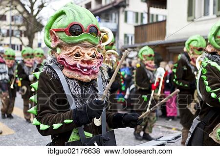 Poison dwarfs, Guggen music, costumes, 35th Motteri-Umzug parade in Malters, Lucerne, Switzerland, Europe View Large Photo Image Stock Photo - Poison dwarfs, Guggen music, costumes, 35th Motteri-Umzug parade in Malters, Lucerne, Switzerland, Europe. Fotosearch
