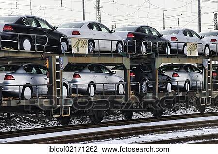 Stock Image - Port railway, freight train loaded with cars, Hamburg, Germany, Europe. Fotosearch