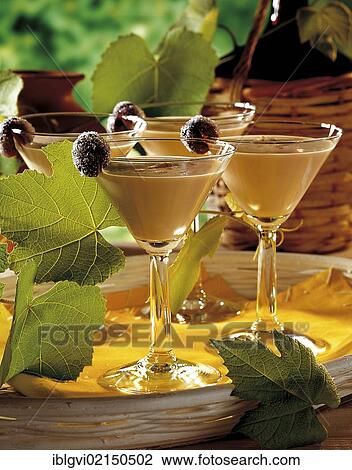 Stock Image - Port Wine Flip Lisboa, brandy, port wine, beaten egg yolk, Portugal, Europe. Fotosearch