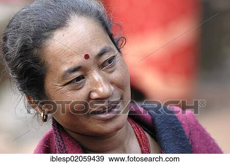 Portrait of a woman, Taumadhi square, Bhaktapur, Kathmandu Valley, Nepal, Asia View Large Photo Image Stock Photo - Portrait of a woman, Taumadhi square, Bhaktapur, Kathmandu Valley, Nepal, Asia. Fotosearch