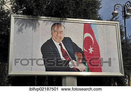 Stock Image - Poster with an image of Heydar Aliyev, 1923 - 2003, from 1993 to 2003 President of the Republic of Azerbaijan and Azerbaijani Dynast, on the beach promenade, Bulevar, Baku, Azerbaijan, Caucasus, Middle East, Asia. Fotosearch