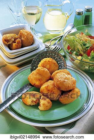 Picture - Potato dumplings with bacon and onion stuffing, Ireland, Europe. Fotosearch