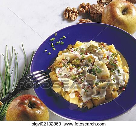 Stock Image - Potato salad with cheese and walnuts, Switzerland, Europe. Fotosearch