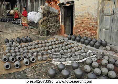 Pottery ware in a historic street, Bahktapur, Kathmandu Valley, Nepal, Asia View Large Photo Image Stock Photography - Pottery ware in a historic street, Bahktapur, Kathmandu Valley, Nepal, Asia. Fotosearch