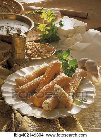 Puff pastry stuffed with feta cheese, hot starter, Turkey, Asia View Large Photo Image Picture - Puff pastry stuffed with feta cheese, hot starter, Turkey, Asia. Fotosearch