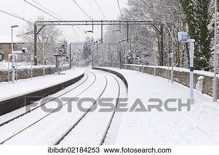 Stock Image - Railway lines in snowy conditions, England, United Kingdom, Europe. Fotosearch