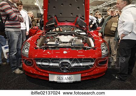 Picture - Raised hood of a Mercedes Benz SLS AMG on display at the Vienna Auto Show 2012, car show, Vienna, Austria, Europe. Fotosearch