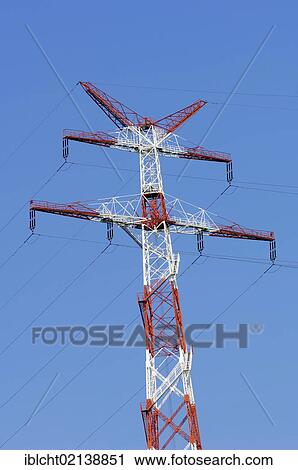 Stock Image - Red and white power pylon, Altes Land, Lower Saxony, Germany, Europe. Fotosearch