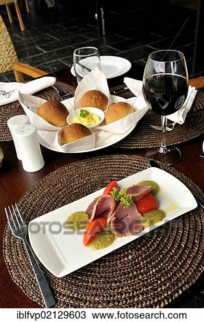 Red wine and appetisers in the restaurant of the Nyungwe Forest Lodge, Nyungwe National Park, Rwanda, Africa View Large Photo Image Stock Image - Red wine and appetisers in the restaurant of the Nyungwe Forest Lodge, Nyungwe National Park, Rwanda, Africa. Fotosearch