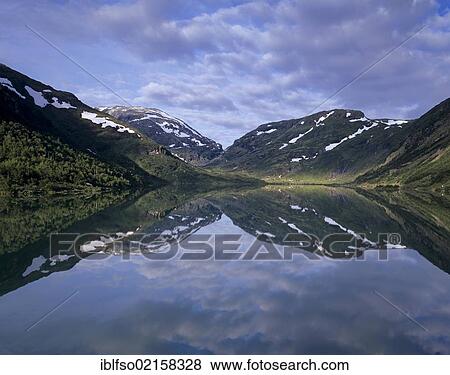 Reflection of mountains in water, Leirdalen, near Lom, Oppland, Norway, Scandinavia, Europe View Large Photo Image Stock Photo - Reflection of mountains in water, Leirdalen, near Lom, Oppland, Norway, Scandinavia, Europe. Fotosearch