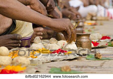 Ritual to bid farewell to the soul of a deceased person, at the ghats of Varanasi, Uttar Pradesh, India, Asia View Large Photo Image Picture - Ritual to bid farewell to the soul of a deceased person, at the ghats of Varanasi, Uttar Pradesh, India, Asia. Fotosearch