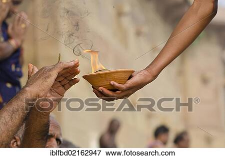Ritual to bid farewell to the soul of a deceased person, at the ghats of Varanasi, Uttar Pradesh, India, Asia View Large Photo Image Stock Photo - Ritual to bid farewell to the soul of a deceased person, at the ghats of Varanasi, Uttar Pradesh, India, Asia. Fotosearch