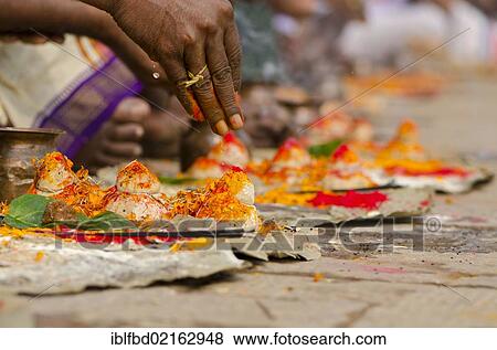 Ritual to bid farewell to the soul of a deceased person, at the ghats of Varanasi, Uttar Pradesh, India, Asia View Large Photo Image Stock Photo - Ritual to bid farewell to the soul of a deceased person, at the ghats of Varanasi, Uttar Pradesh, India, Asia. Fotosearch