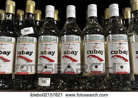 Stock Image - Ron Cubay, rum bottles, sale of rum, tourist shop, town centre of Havana, Centro Habana, Cuba, Greater Antilles, Caribbean, Central America, America, North America. Fotosearch