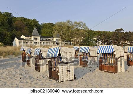 Roofed wicker beach chairs on a beach near Binz, Ruegen, Mecklenburg-Western Pomerania, Germany, Europe View Large Photo Image Stock Image - Roofed wicker beach chairs on a beach near Binz, Ruegen, Mecklenburg-Western Pomerania, Germany, Europe. Fotosearch