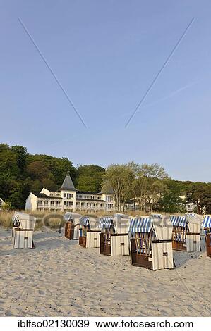 Roofed wicker beach chairs on a beach near Binz, with space in the sky for text, Ruegen, Mecklenburg-Western Pomerania, Germany, Europe View Large Photo Image Stock Photo - Roofed wicker beach chairs on a beach near Binz, with space in the sky for text, Ruegen, Mecklenburg-Western Pomerania, Germany, Europe. Fotosearch