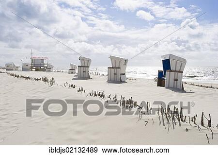 Roofed wicker beach chairs, Westerland, Sylt, Schleswig-Holstein, Germany, Europe View Large Photo Image Stock Photo - Roofed wicker beach chairs, Westerland, Sylt, Schleswig-Holstein, Germany, Europe. Fotosearch