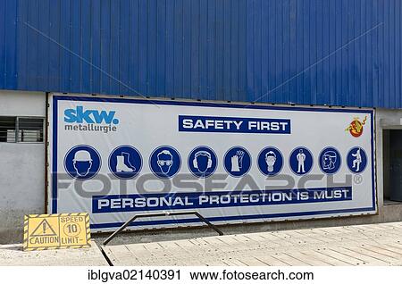 Stock Image - Safety sign of a joint venture with the German specialty chemicals company SKW Metallurgy in the industrial zone of Pasakha near Phuentsholing, Bhutan, Asia. Fotosearch
