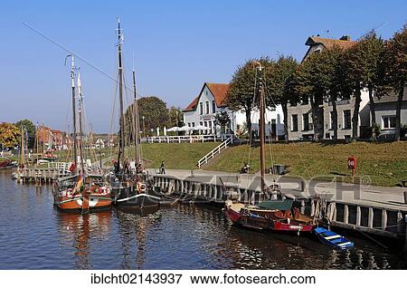 Stock Photo - Sailing ships in the harbour, Carolinensiel, East Frisia, Lower Saxony, Germany, Europe. Fotosearch