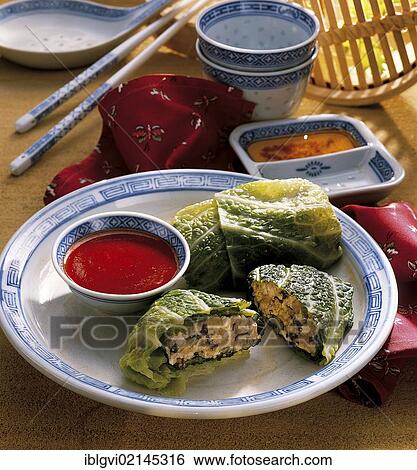 Savoy cabbage turnovers with tofu and mushroom filling and chili sauce, hot starter, China, Asia View Large Photo Image Stock Photograph - Savoy cabbage turnovers with tofu and mushroom filling and chili sauce, hot starter, China, Asia. Fotosearch