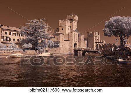 Stock Image - Scaliger Castle, infrared effect, Sirmione, Lake Garda, Italy, Europe. Fotosearch