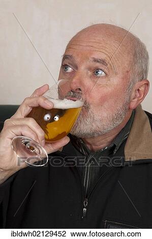Senior man drinking beer View Large Photo Image Stock Image - Senior man drinking beer. Fotosearch