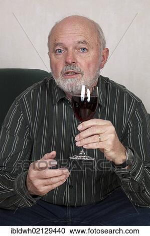 Senior man with wine glass View Large Photo Image Stock Image - Senior man with wine glass. Fotosearch